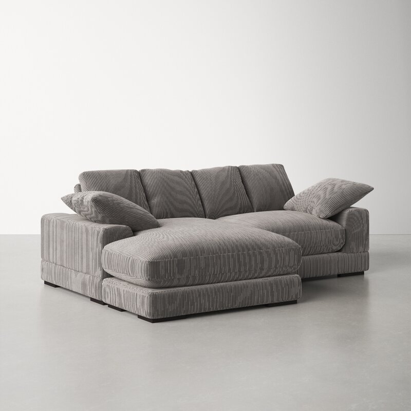 Reversible L-shaped sectional sofa with chaise lounge in a modern living room