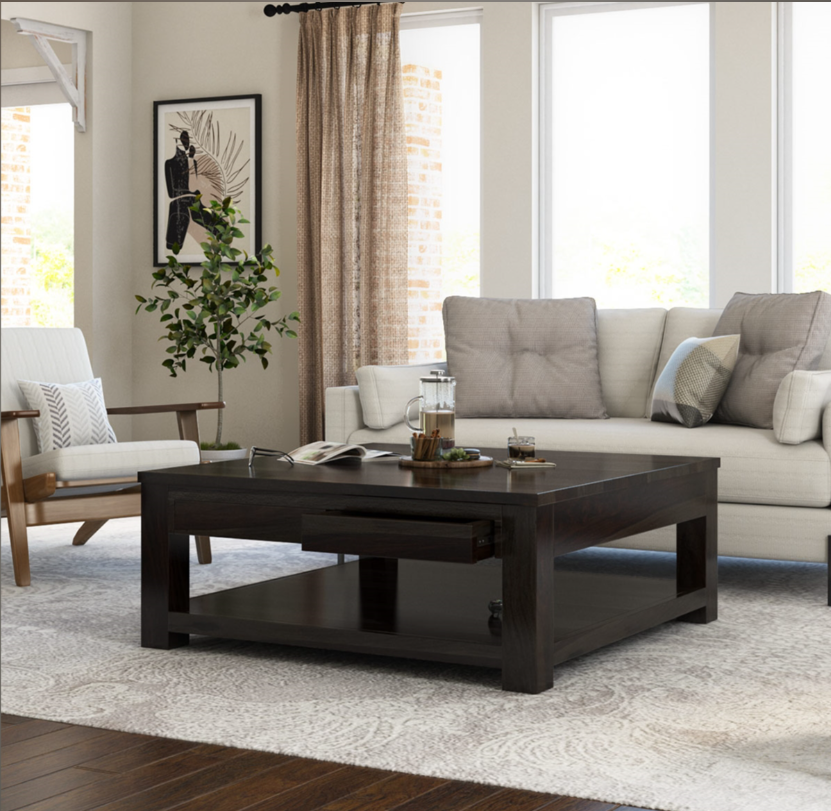 A large square coffee table with a clean contemporary design in a living room.