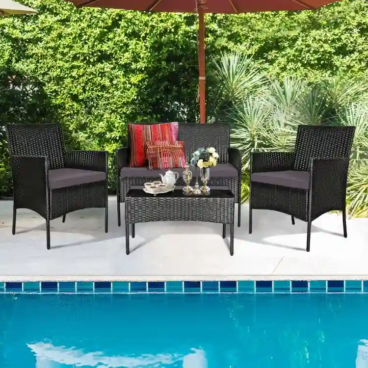 4 Pieces Patio Rattan Cushioned Sofa Set with Tempered Glass Coffee Table - 24 x 23.5 x 33 (L x W x H)