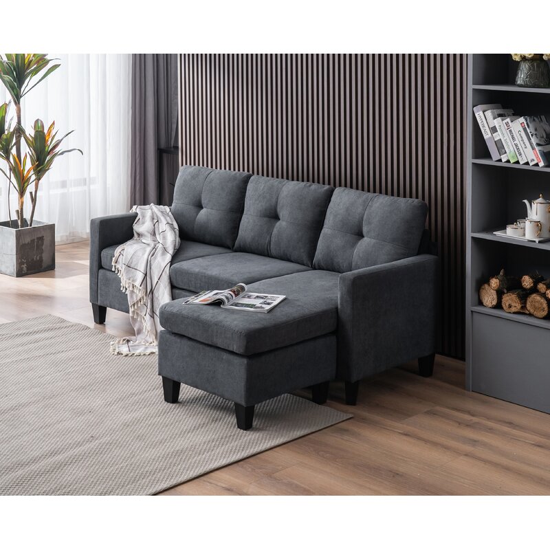 Reversible modular sofa set with chaise and ottoman in a spacious living room