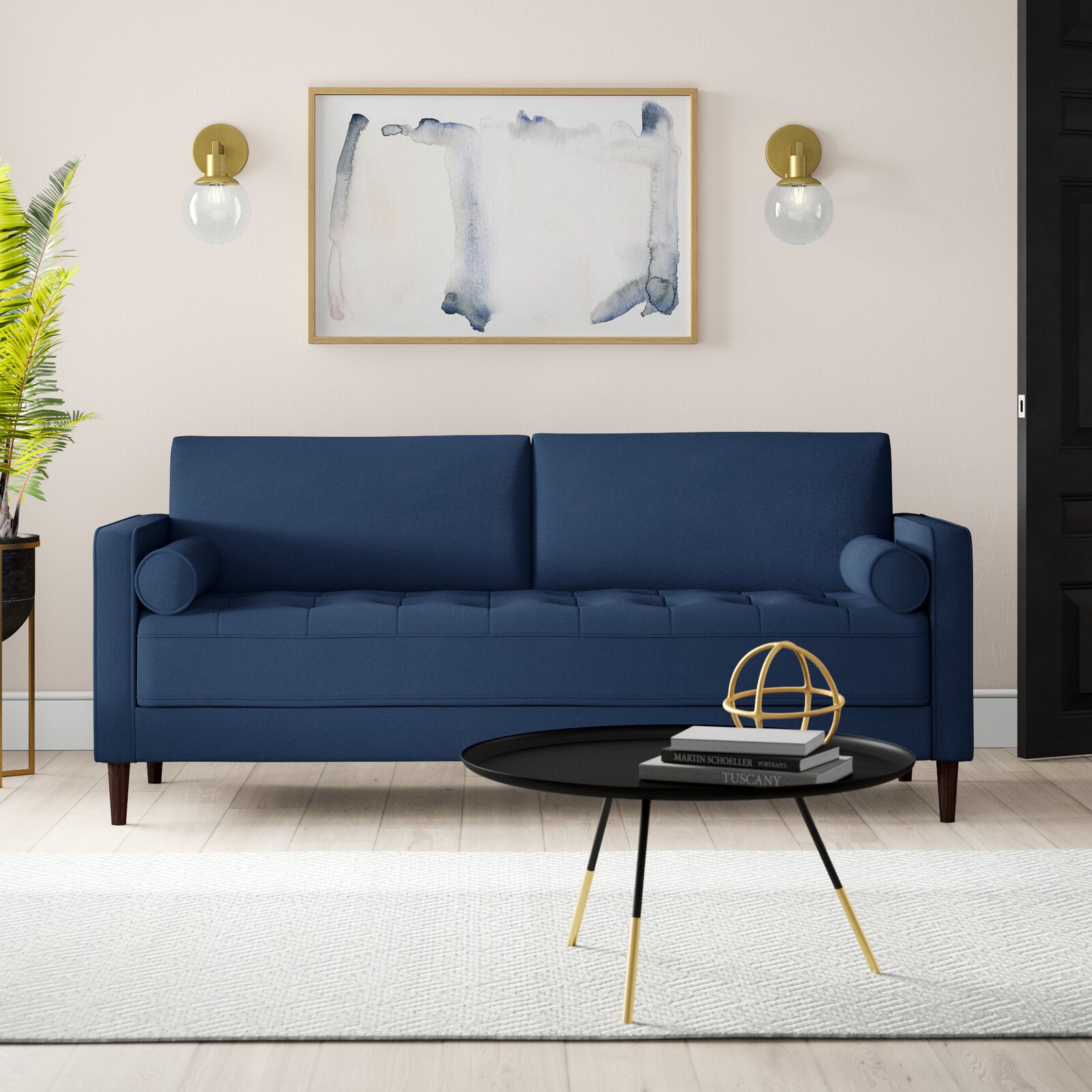 Contemporary sofa with clean square arms and neutral upholstery in a living room setting.