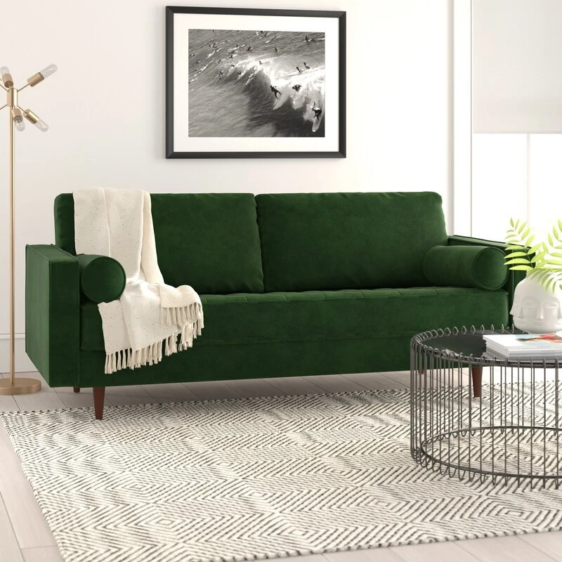 A modern sofa with square arms in a neutral fabric