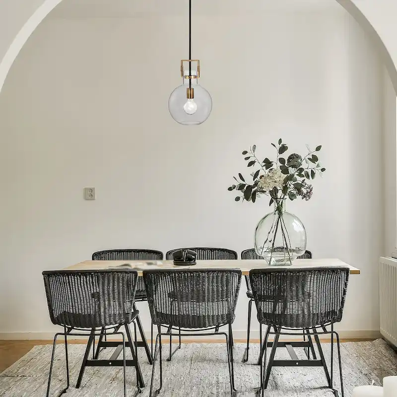 Black and Antique Gold 1-Light 10 Inch Globe Shaped Clear Glass Pendant